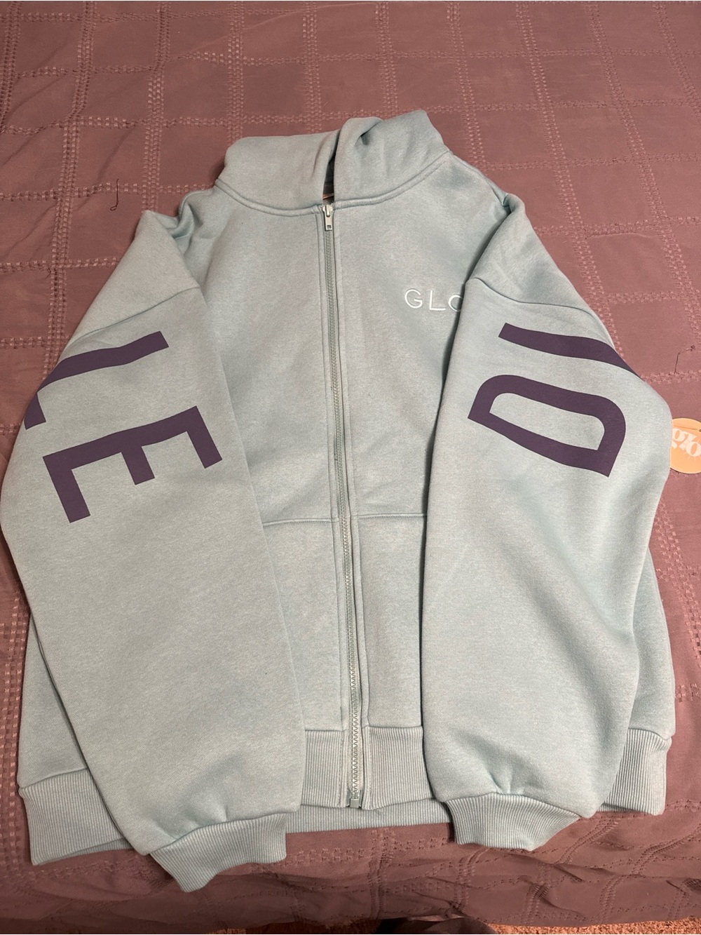 GLO oversized unisex Zip-Up hoodie in teal with navy lettering